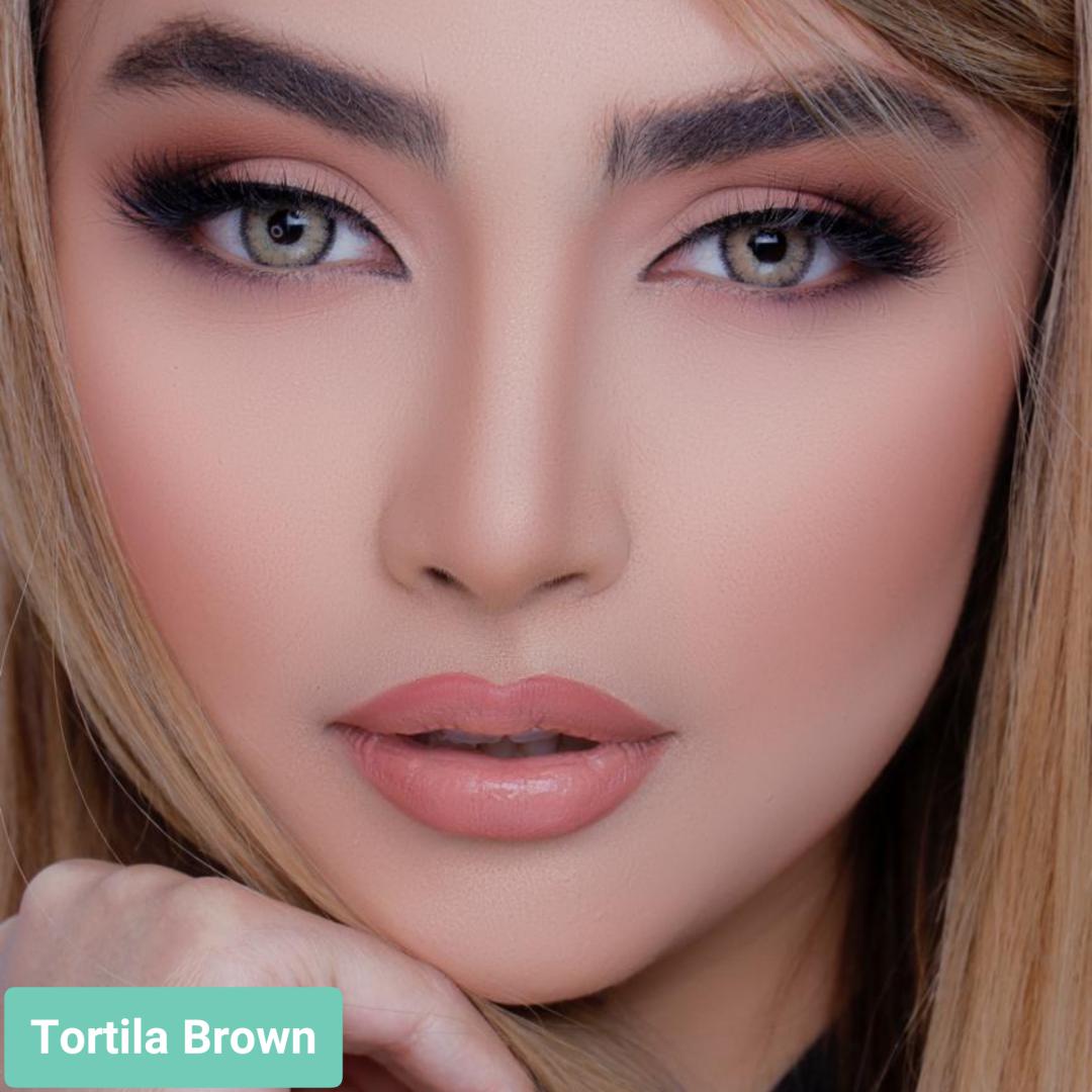  فروش لنز Tortila Brown (عسلی طوسی دوردار)  برند لولیتا بهمراه قیمت امروز لنز رنگی  و قیمت امروز لنز طبی