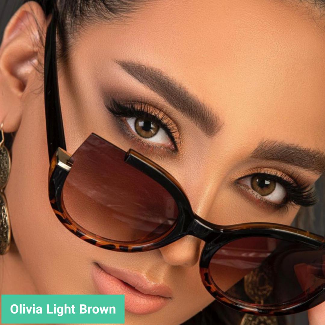  فروش لنز olivia Light Brown (قهوه ای عسلی دوردار)  برند مینی آوا بهمراه قیمت امروز لنز رنگی  و قیمت امروز لنز طبی